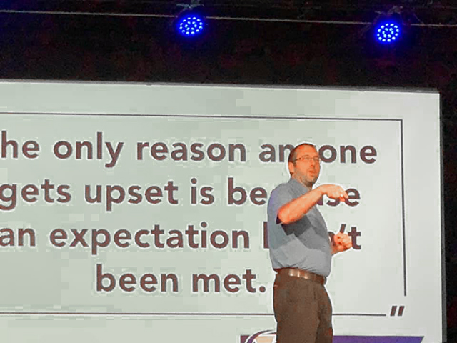 Ben on stage teaching expectations